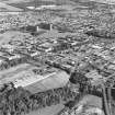 General oblique aerial view of the factory with the industrial estate adjacent, taken from the SW.