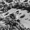 Oblique aerial view centred on the country house, taken from the NW.