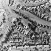 Oblique aerial view centred on the tower-house, taken from the WSW.