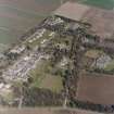 Oblique aerial view centred on the hospital and offices, taken from the WSW.