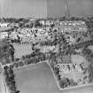 Oblique aerial view centred on the hospital and offices, taken from the S.