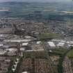 General oblique aerial view of Dundee centred on the industrial estate, taken from the SSW.