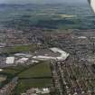 General oblique aerial view of Dundee centred on the ice rink and sports centre, taken from the S.