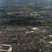 General oblique aerial view of Dundee looking across Caird Park towards Claverhouse, taken from the SSW.