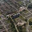 Oblique aerial view of the Ardler Estate centred on a tower block, taken from the WNW.