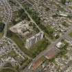 Oblique aerial view of the Ardler Estate centred on a tower block, taken from the SE.