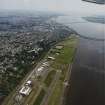 General oblique aerial view of Dundee, the bridges and the airport, taken from the WSW.