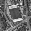 Dundee, Tannadice Street, Tannadice, oblique aerial view, taken from the NW, centred on the Dens Park football ground (under development).