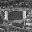 Dundee, Tannadice Street, Dens Park, oblique aerial view, taken from the SSW, centred on Dens Park football ground (under development).
