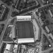 Dundee, Tannadice Street, Dens Park, oblique aerial view, taken from the ESE, centred on Dens Park football ground (under development).