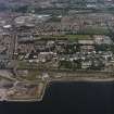 General oblique aerial view of Dundee centred on the school and playing fields, taken from the SSE.