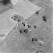Oblique aerial view of Balvaird Castle with Balvaird farmstead, taken from the SSW.
