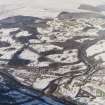 General oblique aerial view of the village with the country house adjacent, taken from the SSE.