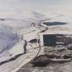 General oblique aerial view of the A9 road looking along Glen Garry towards the Grampian Mountains, taken from the ESE.