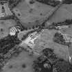 Oblique aerial view of Blair Castle centred on the country house and garden, taken from the WNW.