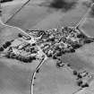 Oblique aerial view centred on the village of Fowlis Wester, taken from the NE.