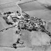 Oblique aerial view centred on the village of Fowlis Wester, taken from the N.