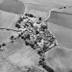 Oblique aerial view centred on the village of Fowlis Wester, taken from the NW.