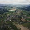 General oblique aerial view looking across the town and village towards Crieff and Strathearn, taken from the WSW.