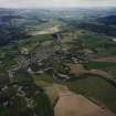 General oblique aerial view looking across the town and village towards Crieff and Strathearn, taken from the WSW.