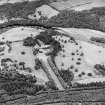 Oblique aerial view of Murthly Castle centred on the castle, chapel and walled garden, taken from the S.