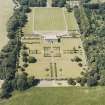 Oblique aerial view of Kinross House centred on the country house with garden, gate and stables, taken from the SE.