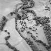 Oblique aerial view centred on the country house and tower-house and the walled garden, taken from the NE.