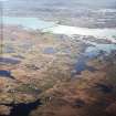 General oblique aerial view centred over the crofting township of Liniclate and Creag Ghoraidh looking towards South Uist beyond, taken from the N.