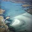 Oblique aerial view centred on the causeway, taken from the NNW.