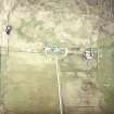 Oblique aerial view centred on the house and farmsteading, taken from the WNW.