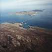 Oblique aerial view centred on the causeway, with the townships adjacent, taken from the NW.
