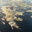 Oblique aerial view centred on the village, taken from the SE.
