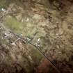 Oblique aerial view centred on the crofting township and the remains of the buildings, taken from the SSE.