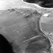 Aerial view of Orkney, Sandi Sand, anti-tank blocks in the inter-tidal area, taken from the NW.  Also visible is Dingy's Howe broch at Upper Sanday.