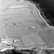 Oblique aerial view of Sanday, Whale Head (Lopness) Radar Station, taken from the SSE