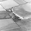 Oblique aerial view of Sanday, Stove Farmhouse, old steading, new steading and workmen's cottages, taken from the ENE