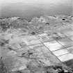 Stroma, oblique aerial view, taken from the E, showing Nethertown township in the right half of the photograph, and Uppertown township in the left half.