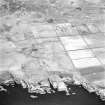 Stroma, oblique aerial view, taken from the E, showing Nethertown township in the right half of the photograph, and Uppertown township in the left half.