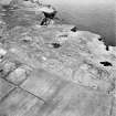 Stroma, oblique aerial view, taken from the NE, showing Nethertown township in the centre of the photograph.