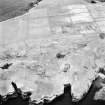 Stroma, oblique aerial view, taken from the WNW, showing Nethertown township in the centre of the photograph.