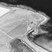 Oblique aerial view of Orkney, South Ronaldsay, Howe of Hoxa, broch and Little Howe of Hoxa settlement, taken from the NE.