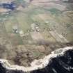 Oblique aerial view centred on the crofting township, taken from the WNW.
