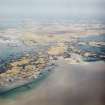 General oblique aerial view centred on the island of Grimsay with peat cutting in the foreground, taken from the W.