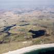 General oblique aerial view looking across Benbecula, with the crofting townships in the foreground, taken from the WNW.