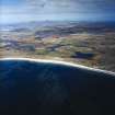 General oblique aerial view over the Isle of Benbecula with Eaval and Ronay in the distance, taken from the SW.