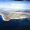 General oblique aerial view over the Isle of Benbecula with Eaval and Ronay in the distance, taken from the SSW.