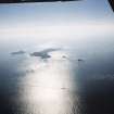 General oblique aerial view looking towards the Shiant Islands, taken from the NNW.