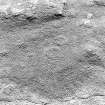 Oblique aerial view of Garbeg centred on the remains of two hut-circles in an area of small cairns and a field-system, taken from the NNW.