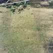 Oblique aerial view of Garbeg centred on the remains of hut-circles, buildings and a field-system, taken from the SE.