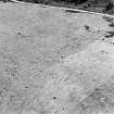 Oblique aerial view of Garbeg centred on the remains of hut-circles, buildings and a field-system, taken from the NE.